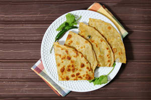 Pyaj Prantha  (with Mix Pickle, Curd And Butter)