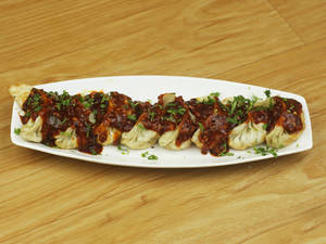 Veg Pan Fried Momos With Schezwan Sauce 