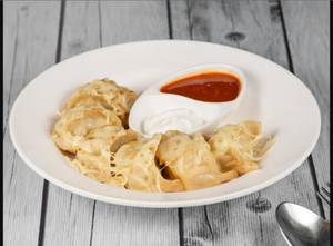 Veg Steamed Cheese and Butter Momos (6 Pcs)
