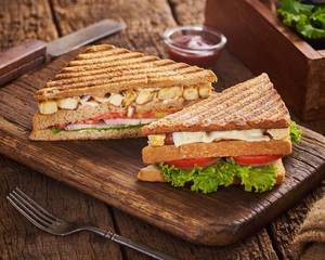Exotic Veggie Club Wheat Sandwich []595 Kcal
