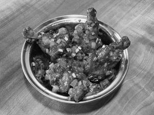 CHILLI GARLIC LOLLIPOP
