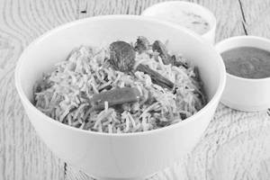 Veg Biryani With Mix Raitha And Coke