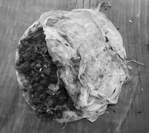 Veg Kizhi Parotta