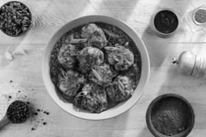 Veggie Wheat Momos In Gravy