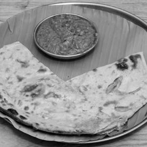 Masala Stuffed Paratha with Paneer Butter Masala