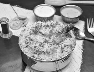Chicken Dum Biryani With Free Cold Drink & Raita