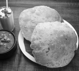 Punjabi Chole Bhatoora + Sweet Lassi (Half)