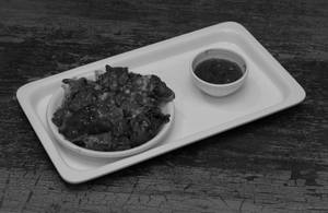 Schezwan Paneer Gravy Momos (6 Pcs)