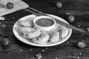 Chicken schezwan steamed momos