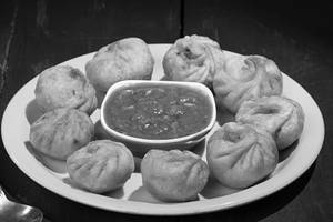 Mushroom Momos (free 2 Dips))