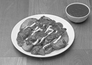 Schezwan Chilli Cheese Potato Wedges 