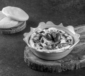 Labneh With Confit Garlic, Sumac Onions & Pomegranate Molasses