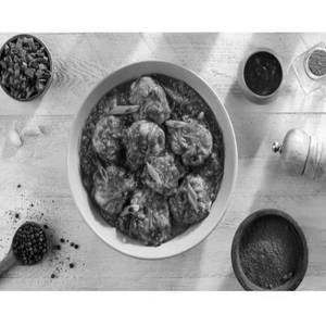 Chicken Shezwan Wheat Momos In Gravy