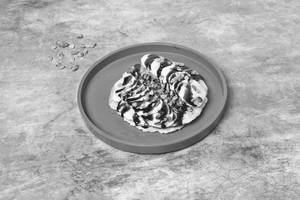 Pancake With Banana And Chocolate Syrup