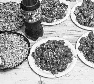 2 Veg Hakka Noodles + 2 Veg Manchurian Dry + 2 Paneer Chilli Dry + 1 Thums Up (600 Ml)