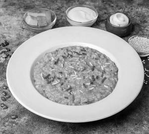 Ghee Loaded Dal Khichdi ( With Fruits N Curd)