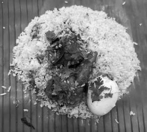 Kizhi Biryani Chicken With Egg