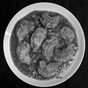 Gravy Momos (7 Pcs)