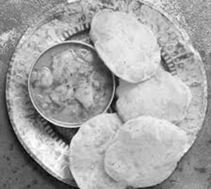 Puri [6 Pcs] + Aloo Tamatar Gravy + Achar
