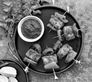 The Urban Pind Tawa Fish Tikka Biryani Served With Raita+ (rasbhari Jamun Rasgulla Box)