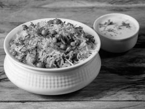 Veg Biryani(served With Raita And Gravy)