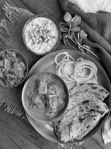 Lachha Parantha [ Shahi Paneer + Dal Makhni + Dahi + Lachha Parantha ]