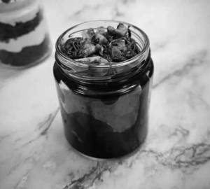 Brownie With Hot Fudge Sauce And Crunchy Roasted Nuts