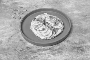 Pancake With Banana And Maple Syrup