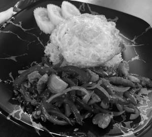 Stir Fried Pork With Green Pepper Served With Rice And Fried Egg 