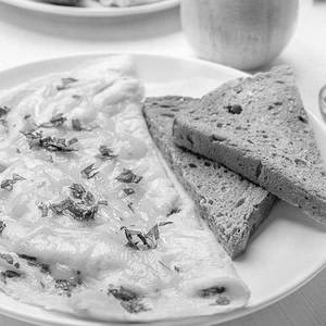 Omelette And Toast With Butter And Jam