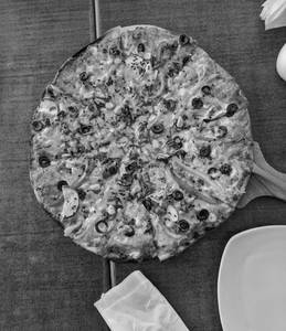 Onion with corn menia pizza                                               