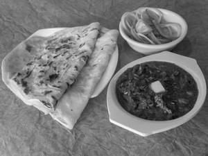 Red Butter Chicken (2Pcs)+ 2Pc Rumali Roti or 2Pc Mughlai Paratha