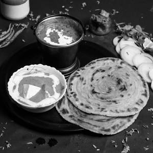 Dal Makhni [300 Ml] With Shahi Paneer [300 Ml] And 2 Lachha Paratha