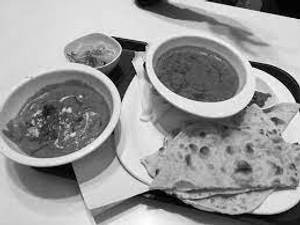 Black Dal Tadka With Paneer Tikka