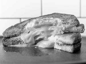 Egg O Mania Sandwich (Served with Fries & Salad)