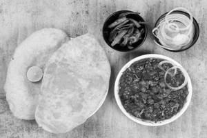 Chole [250ML] + 2 Bhature + Pickle + Salad