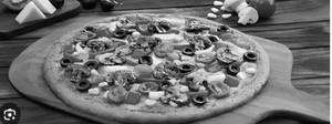 B.com Veg Loaded Pizza