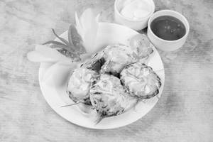 Veg Afghani Momos (8 Pcs)