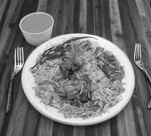 Hyderabadi Chicken Biryani (1 Kg) + 300 ml Coke
