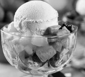 Fruit salad with butterscotch ice cream