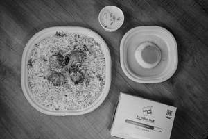 Chicken Tikka Biryani (regular) Free + Free Caramel Custard