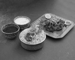 Mini Chicken Biryani + Mini Chicken Village Kebab + Dal + Phulka