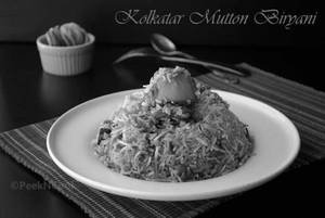 Kolkata Mutton Biryani (with Raita And Sweet)