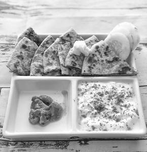 Paneer Paratha With Raitha & Pickle