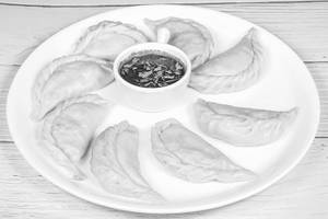Fish Steamed Momos [8 Pieces]