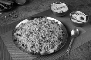 Veg Dum Biryani With Raita