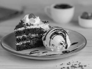 Black Forest Cake With Ice Cream And Chocolate Sauce