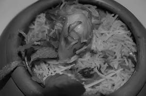 Chicken Handi Dum Biryani + Raita + Gravy + Onion