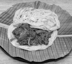 Kizhi Porotta (Chicken/Beef)