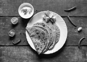 2 Pc Sattu Paratha (served With Dahi+achar )